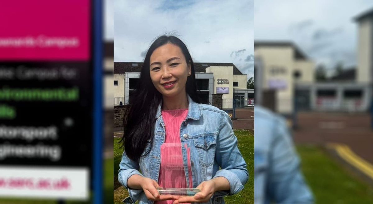 Sylvia Yue at Newtownards Campus, holding her award